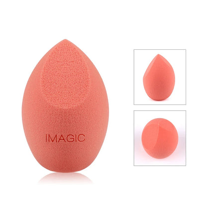 Coral-colored makeup sponge with 'IMAGIC' branding on a white background